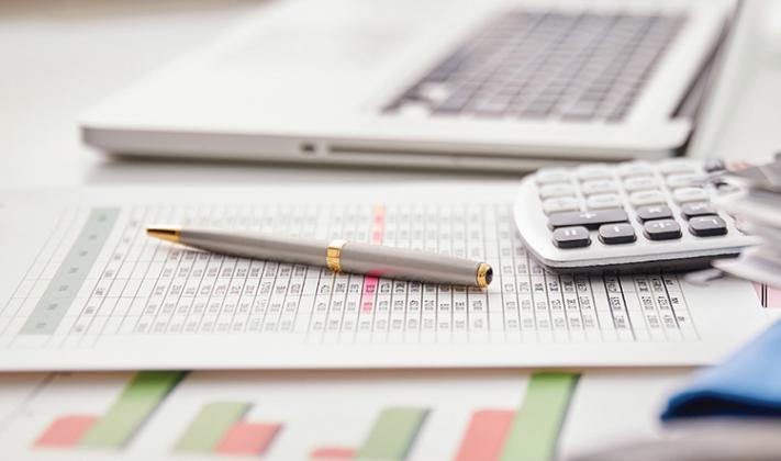 financial reports and calculator