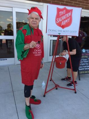 HAVING FUN RINGING THE SALVATION ARMY BELL