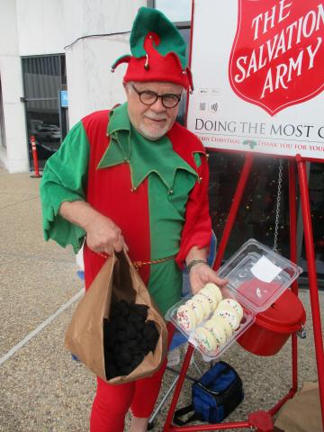 THE ELF RINGS SALVATION ARMY BELL AT  GOVERNMENT PLAZA
