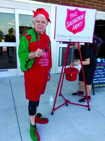 HAVING FUN RINGING THE SALVATION ARMY BELL